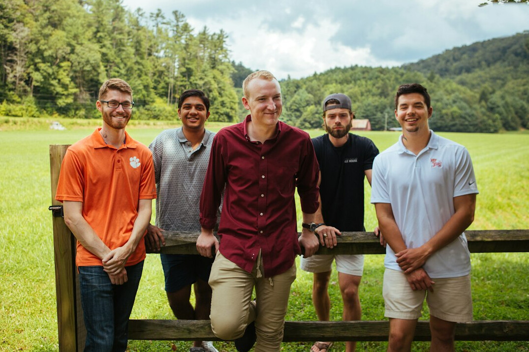 team of researchers in field