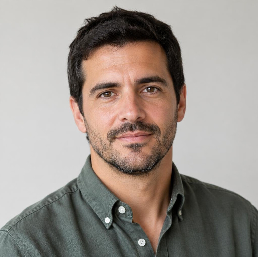 Portrait of a bearded man in casual shirt
